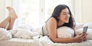 Woman text messaging her boyfriend