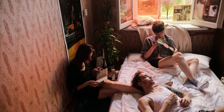 people together on a mattress