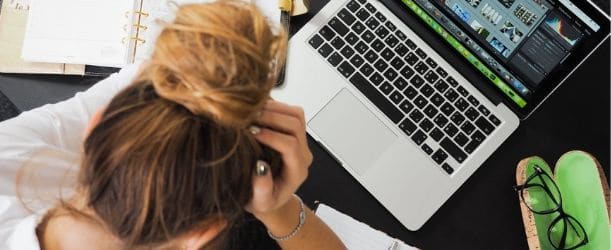 woman upset at her computer