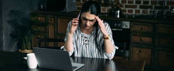 Woman on phone stressed out
