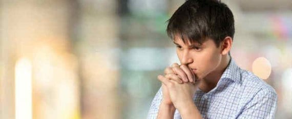 Man staring into space