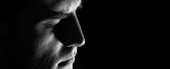 Face of man looking downwards