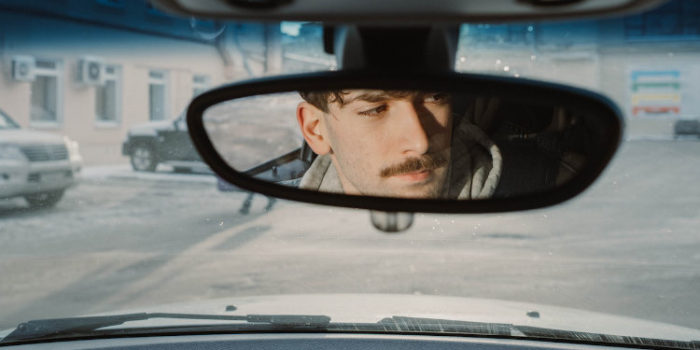 psychopath sitting in car