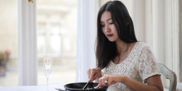 woman eating small portion