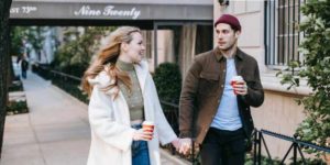 Couple walking holding hands