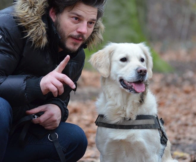 a man with his emotional support dog