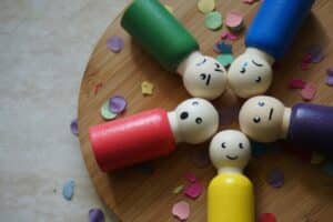 Five figurines representing certain emotional states.