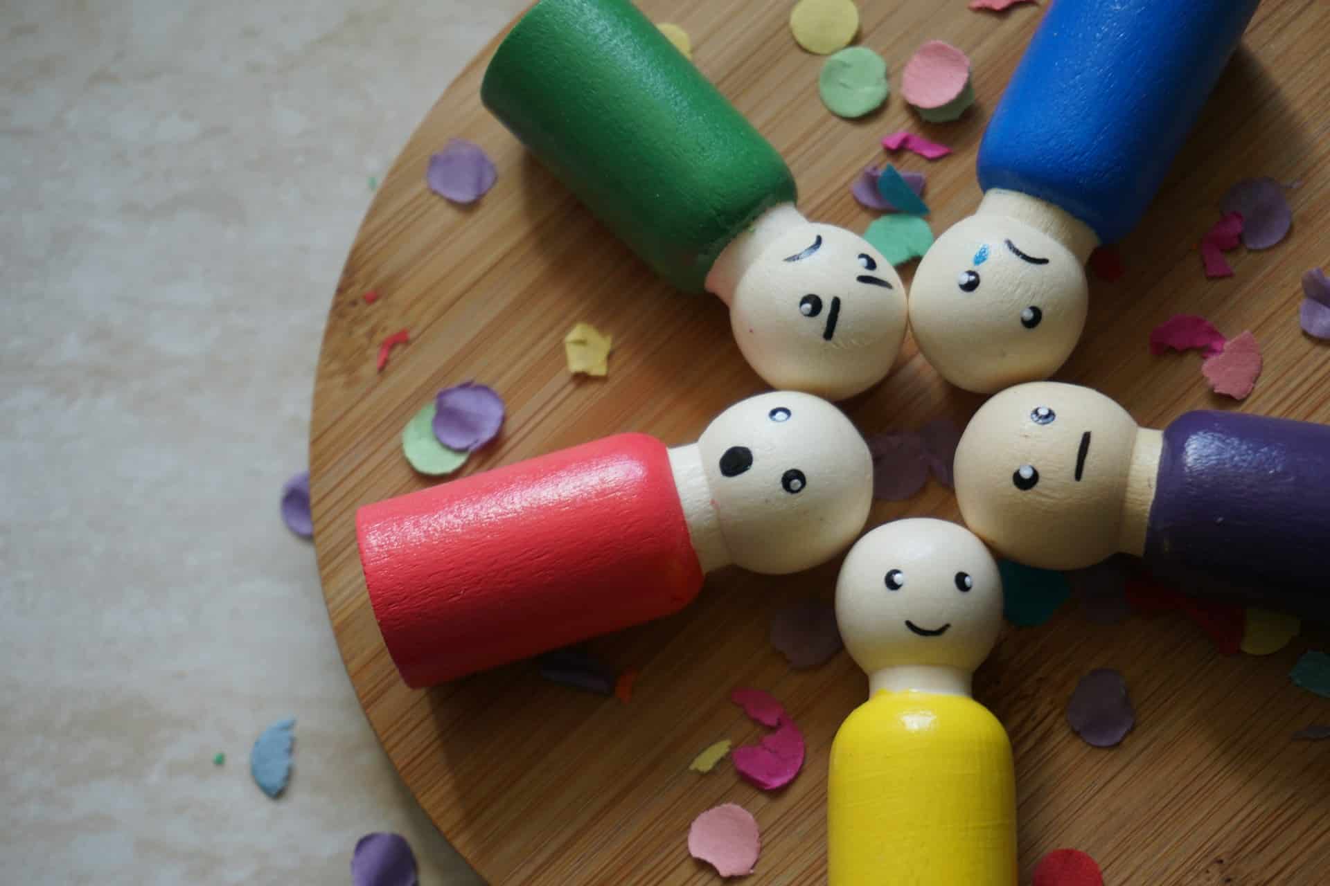 Five figurines representing certain emotional states.