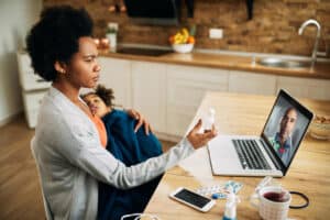 Woman on video chat with therapist