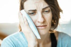 woman experiencing tooth pain