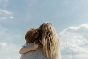 mother holding her child