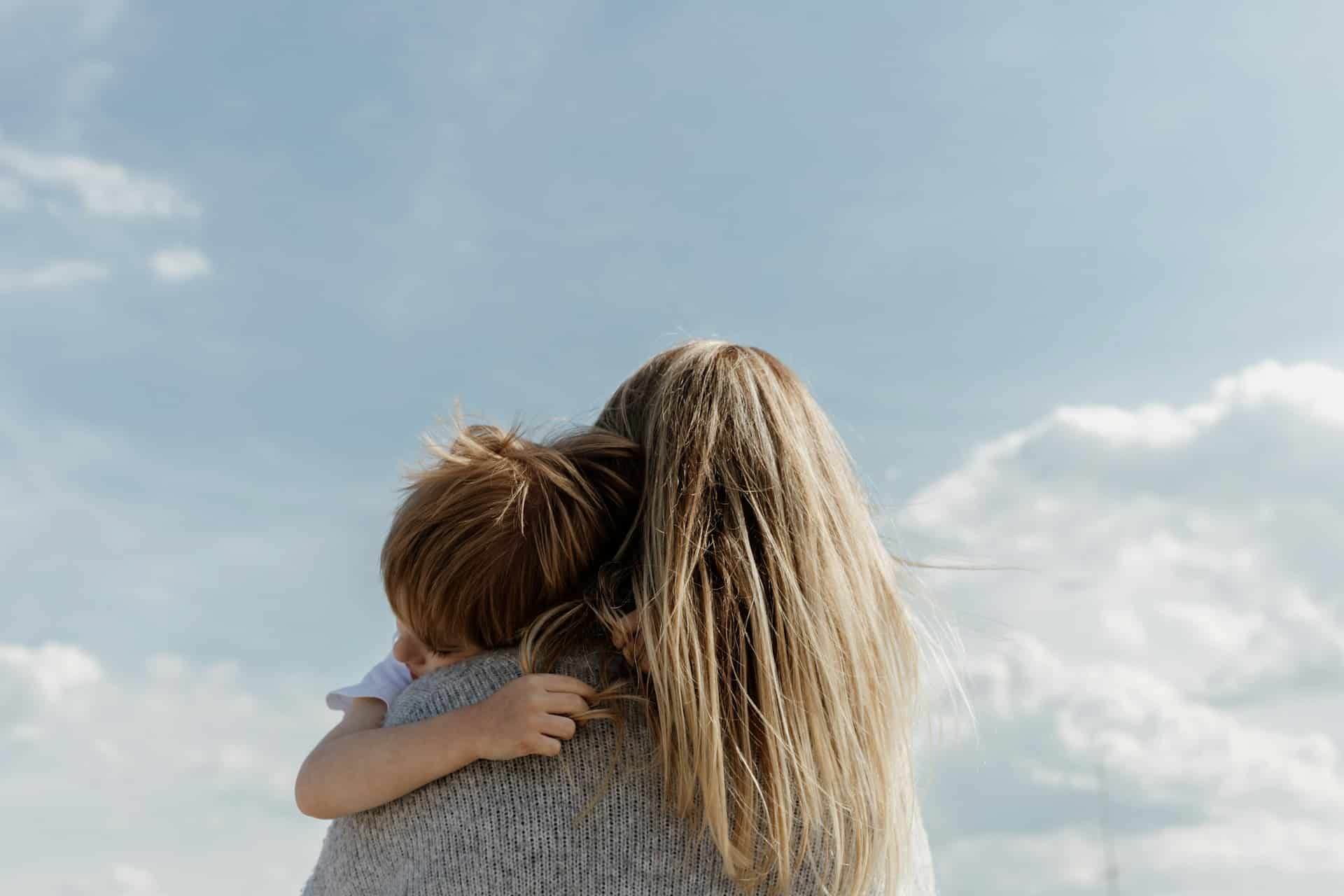 mother holding her child