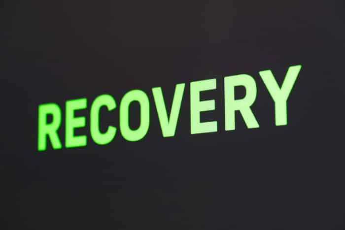 The word RECOVERY against a black background