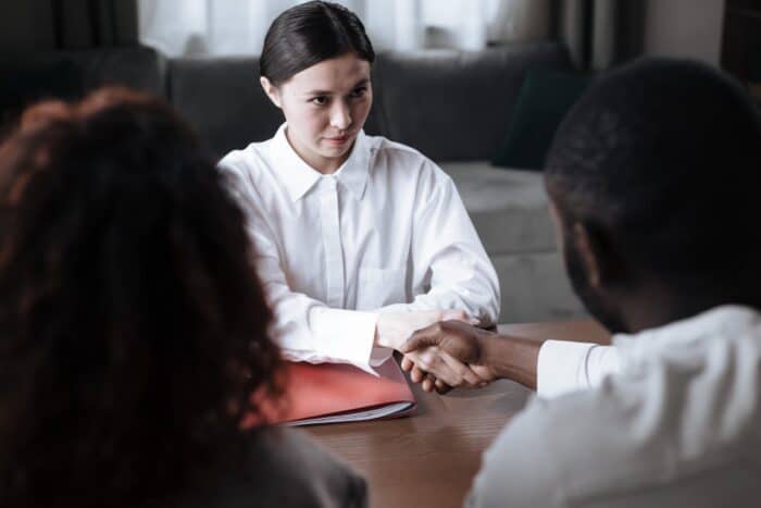 social worker speaking to couple