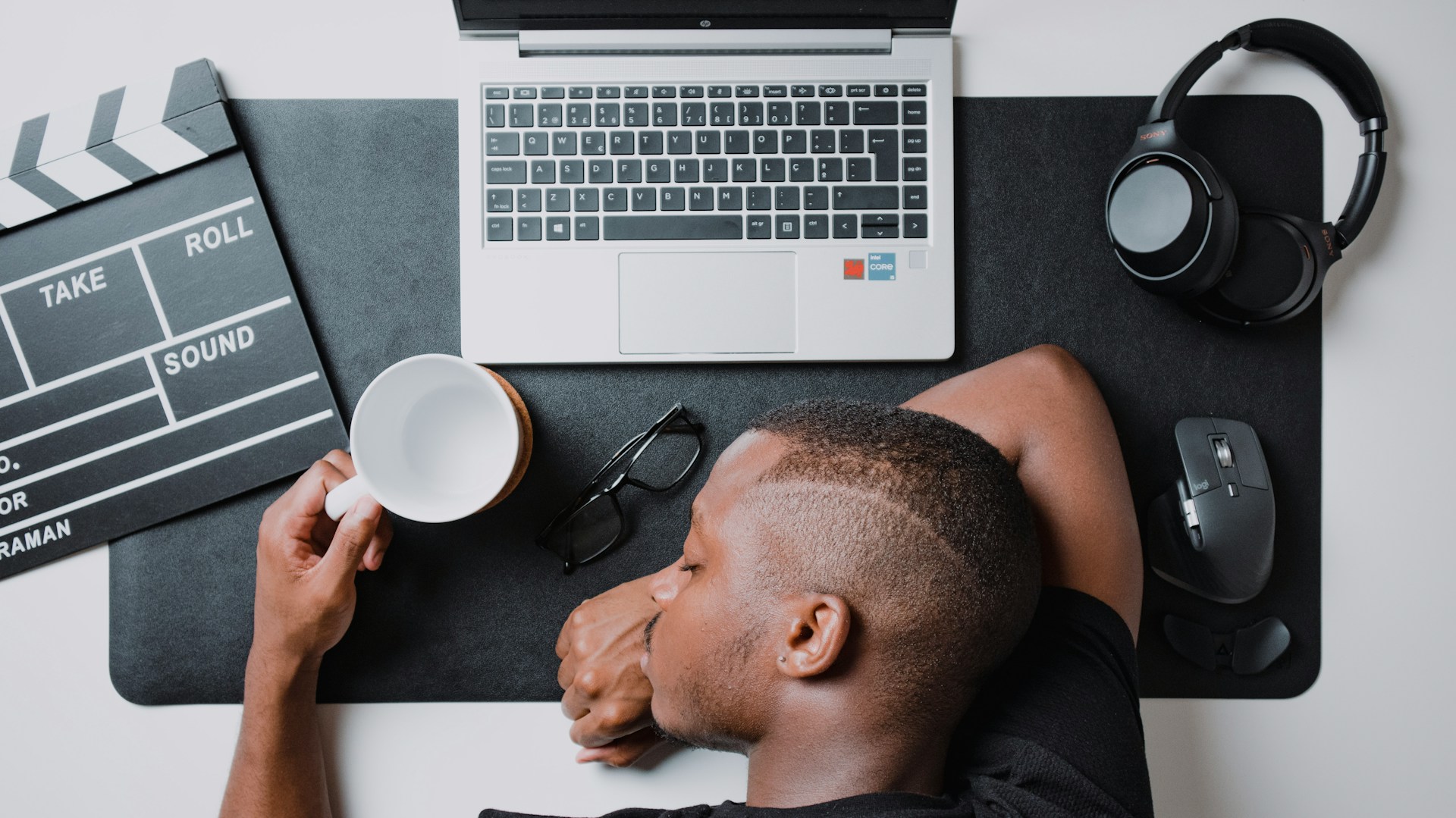 man asleep at his desk