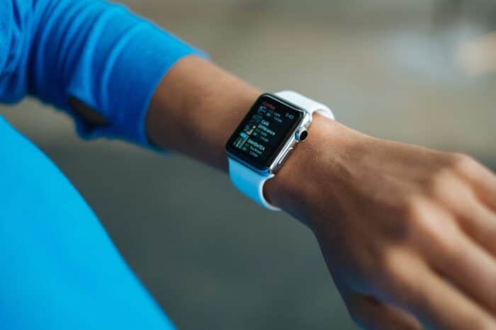 Person Wearing Smartwatch showing vital health information