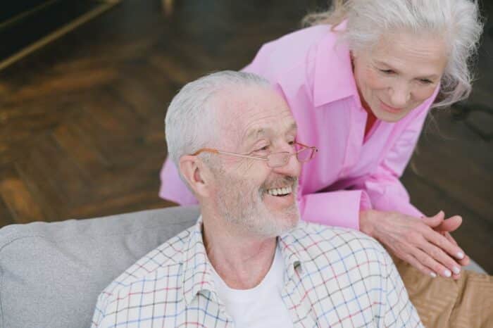 Elderly couple enjoying a conversation