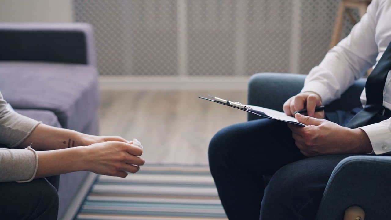 A therapy session with a psychologist and patient