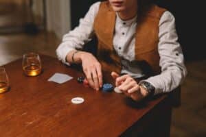 addicted gambler playing cards